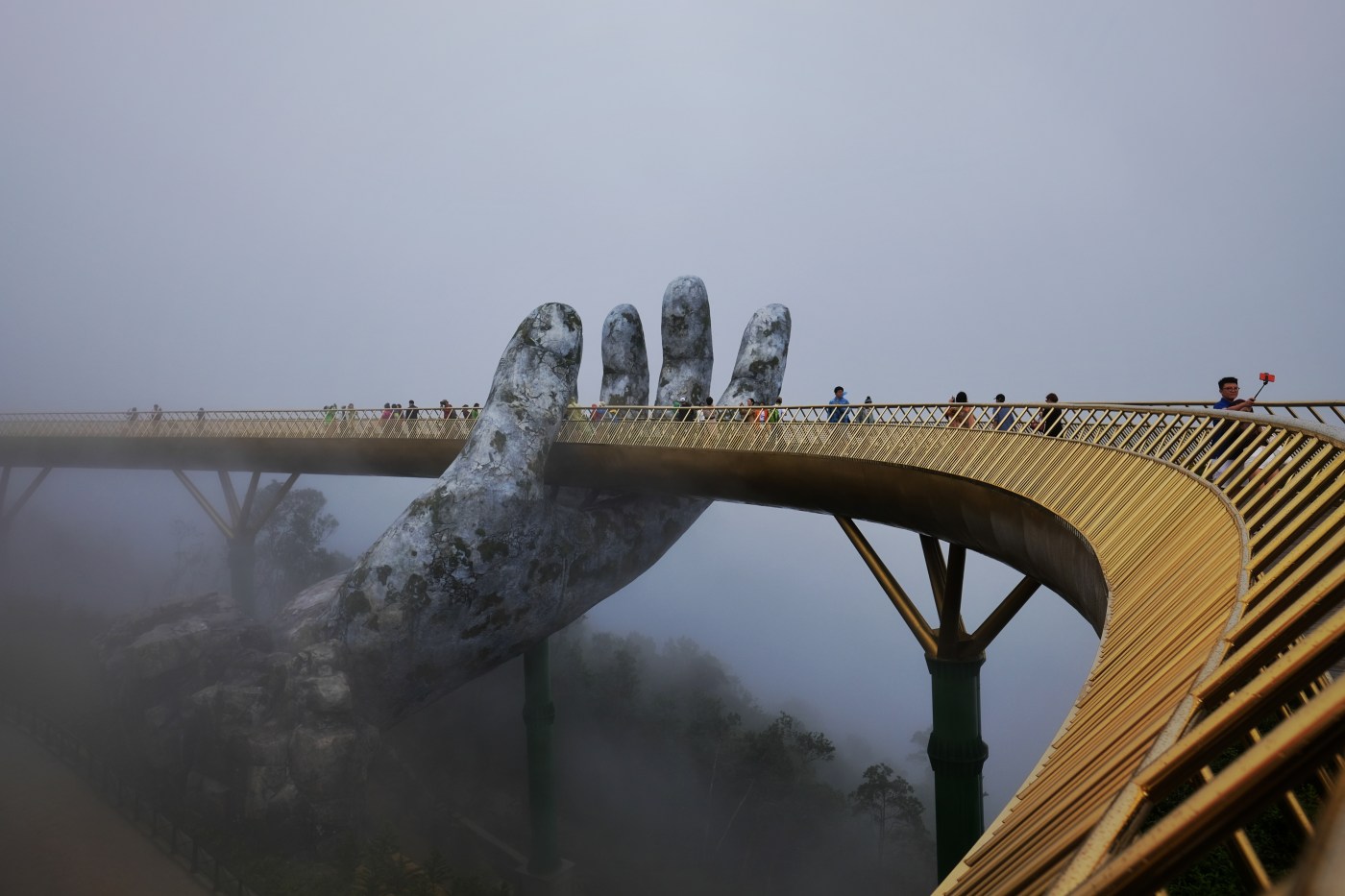 bridge across foggy abyss